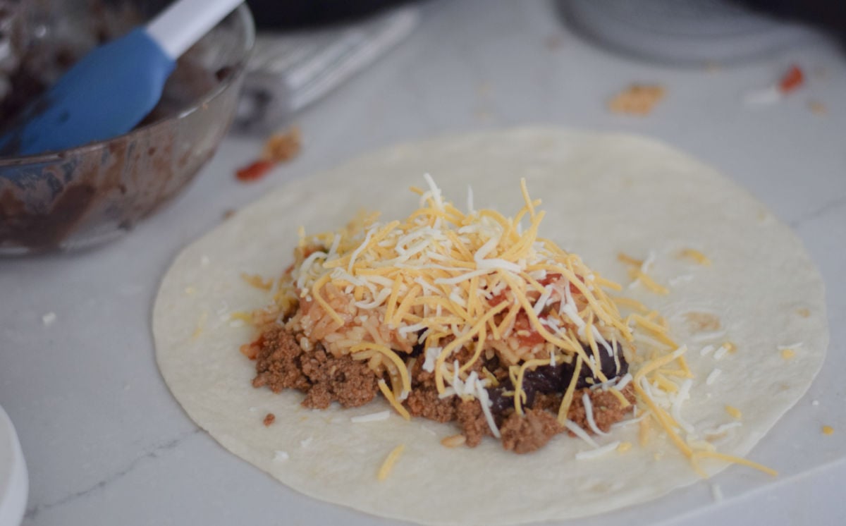 making wet burritos folding tortilla